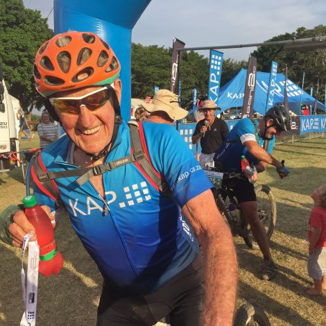 Arthur Duncan, aged 83, from Howick, today completed the 260 km Adventure version of the three day KAP sani2c mountain bike stage race at Scottburgh. In the background is his son-in-law and race partner, Stuart Watson The KAP sani2c mountain bike stage race has been underway since Tuesday when the Trail version of the event started. The Adventure started on Wednesday and on Thursday the Race event started, which attracts the top elite mountain bikers in the country. The roughly 260 km KAP sani2c race route begins at Glencairn farm in Himeville, and sees riders pass through the breathtaking scenery of the Southern Drakensberg, down into the Umkomaas Valley, through Vernon Crookes Nature Reserve and to the coast at Scottburgh. With over 4200 riders taking part, it is the largest mountain bike stage race in the country The Race finishes tomorrow in Scottburgh, and with Nico Bell and Matt Beers having won stage 1 and 2 on the first two days, they look strong to win the mens race tomorrow. Amy Mc Dougal and Samantha Sanders were first amongst the women for the second day running, and Yolandi du Toit and Ben Melt Swanepoel in the mixed teams.