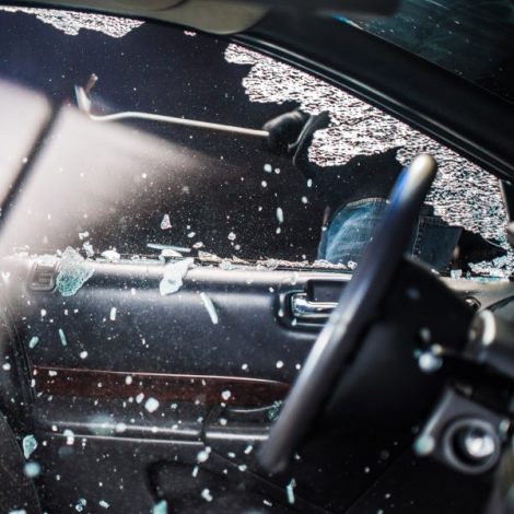 Smashed car window hijack smash and grab