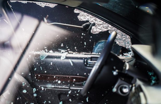 Smashed car window hijack smash and grab