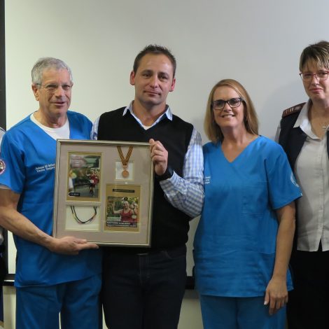 ‘Miracle Man’ hands Marathon medal to trauma surgeon who saved his life!