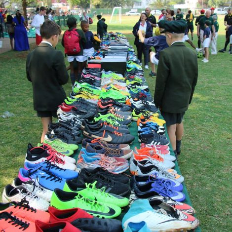Young students collects hundreds of soccer boots for underprivileged kids!