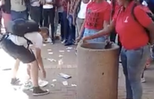 Kid goes viral for picking up trash that EFF members keep throwing on the ground.