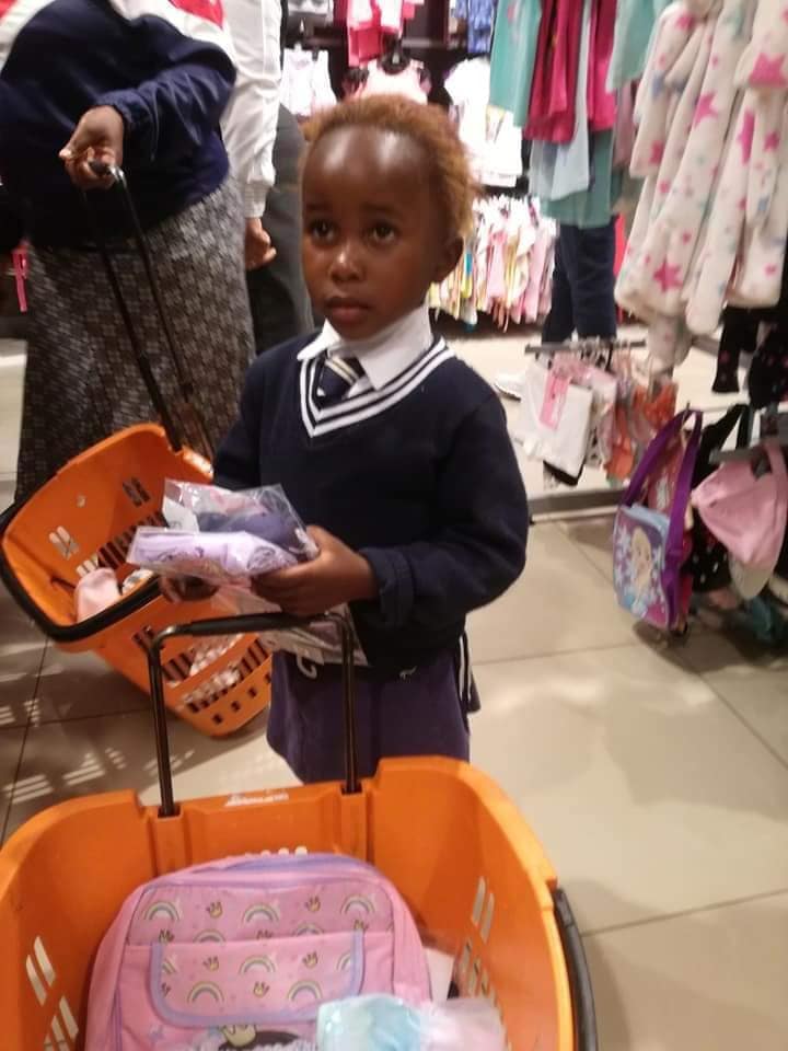 Kind man buys little girl new uniform, pays for her school fees for life!