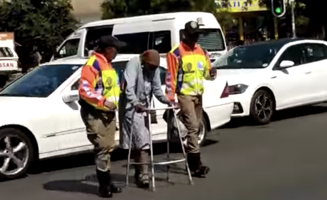 JMPD officers helping an elderly lady across the road is the best thing you will see today!