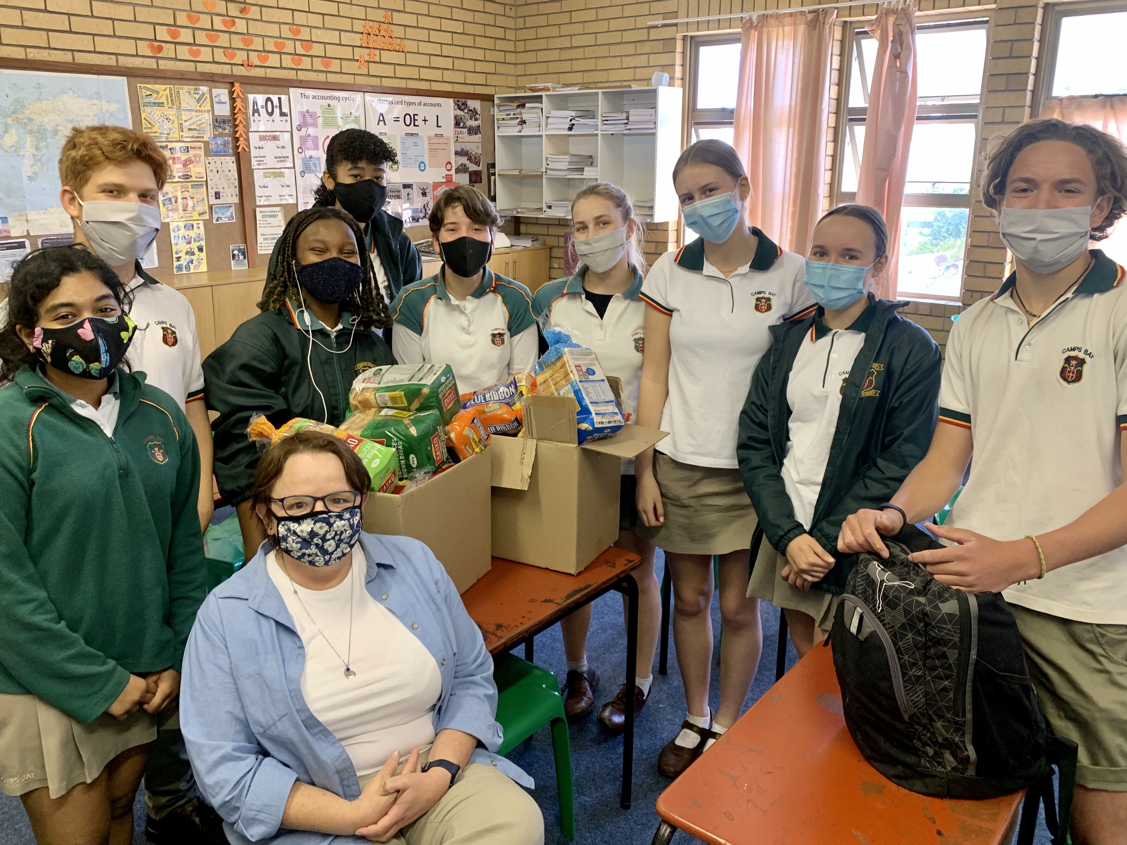 Students make sandwiches for Ladles of Love during their breaks