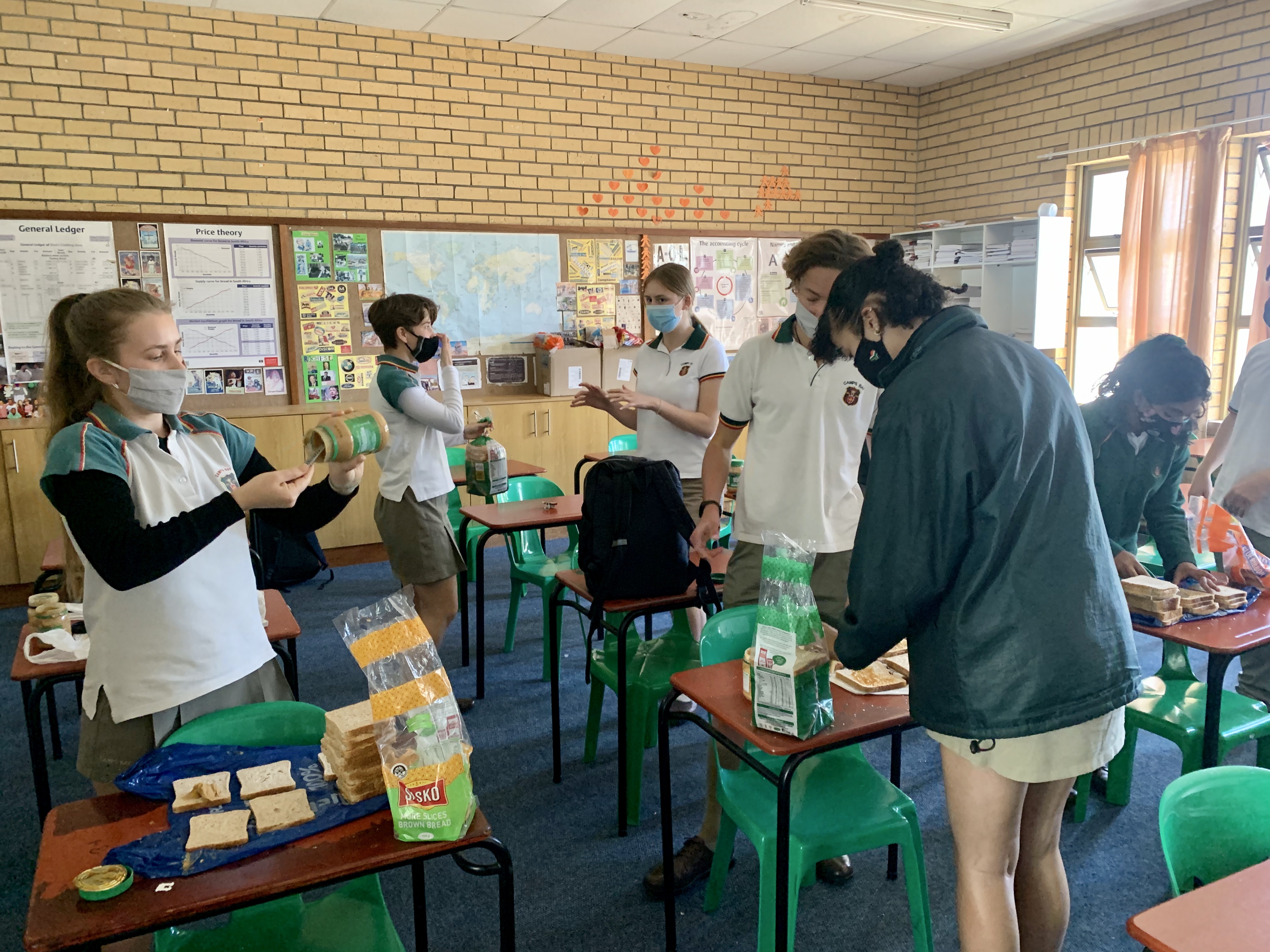 Students make sandwiches for Ladles of Love during their breaks