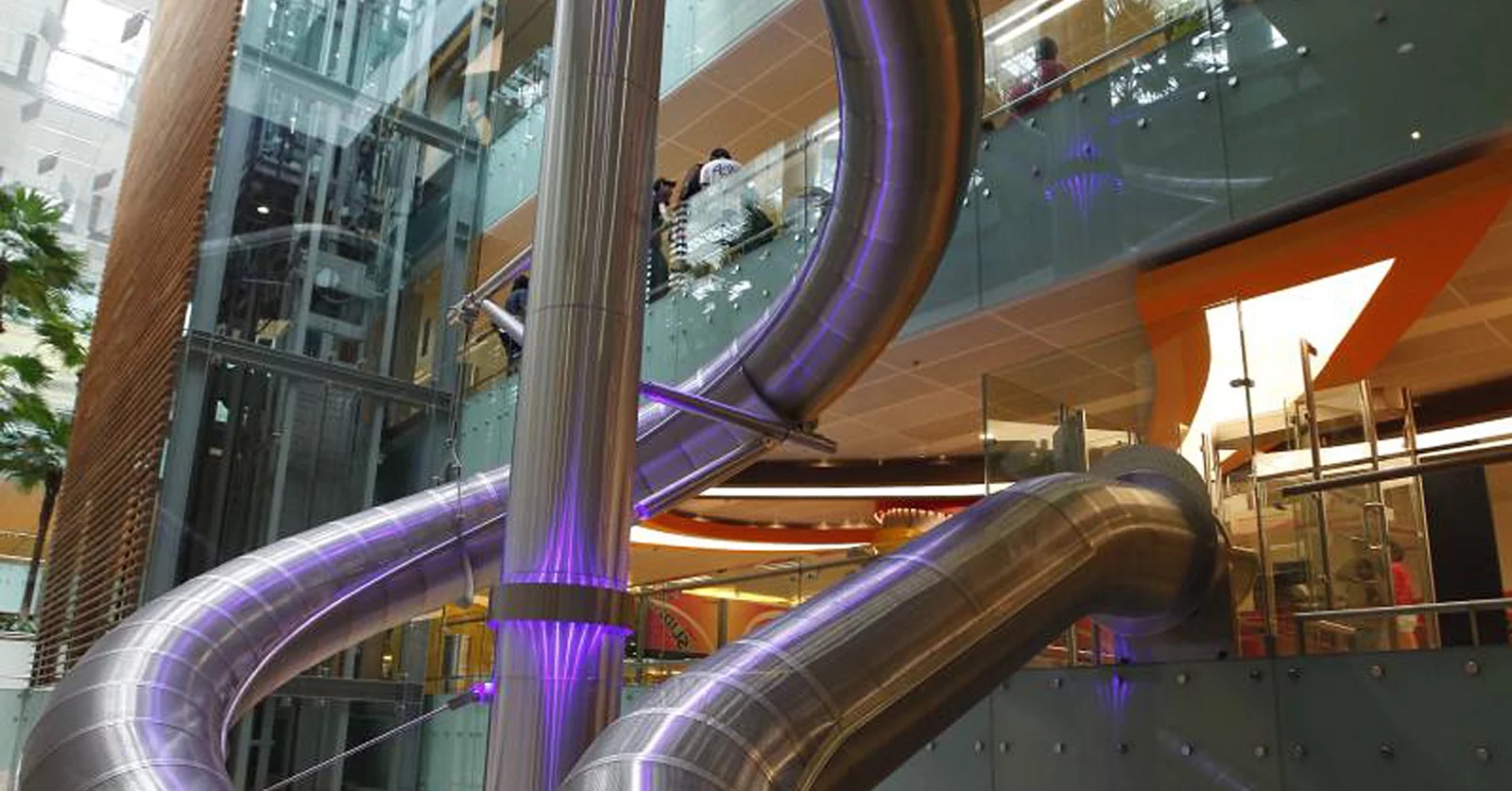 There is an Airport with a boarding gate slide! Yup, now we can't wait to travel again.
