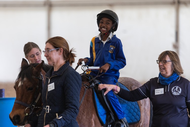 Horses Offer Disabled Children